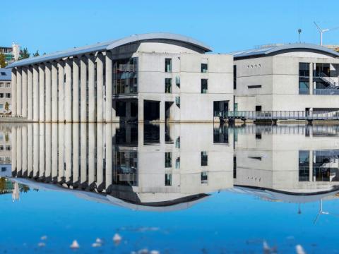 Reykjavík City Hall reflected in the pond.