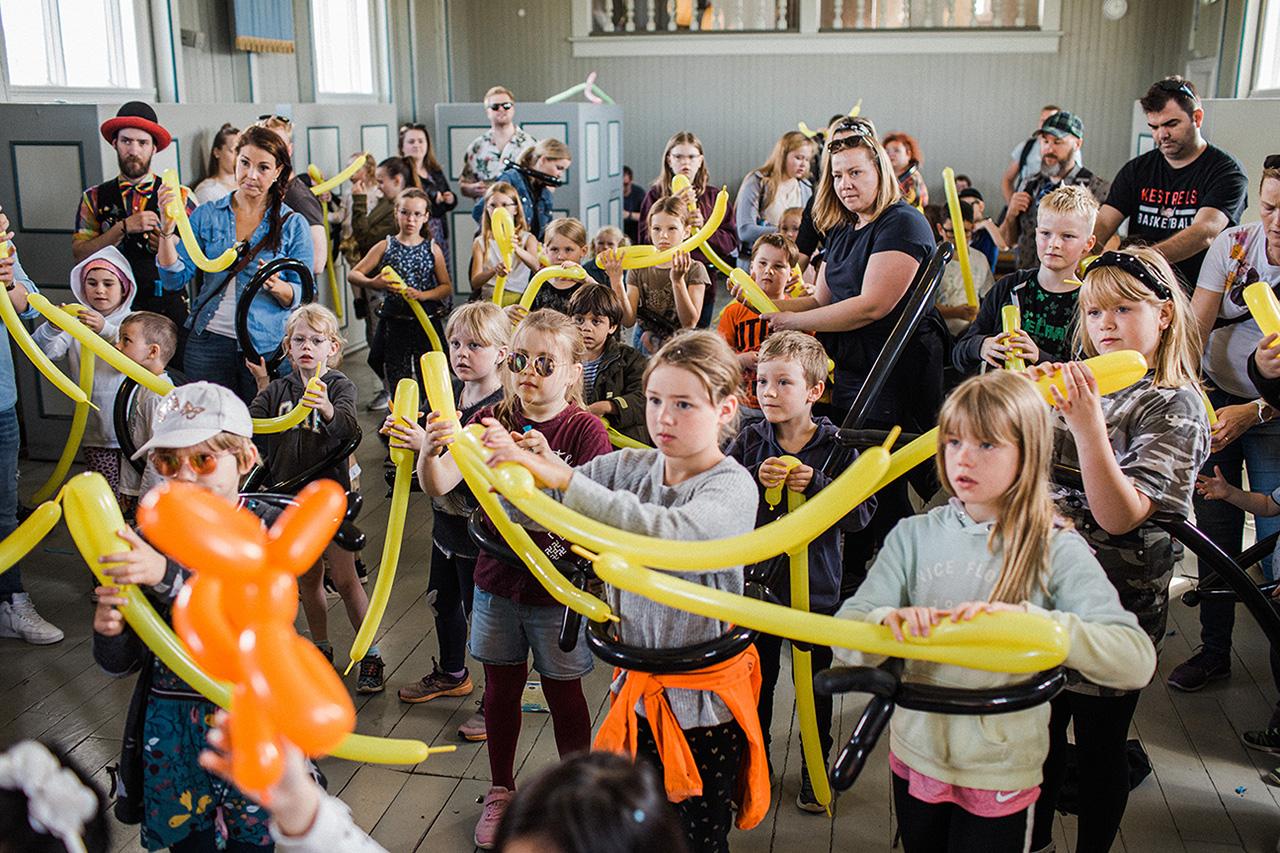 Children playing with bubbles at a children's cultural festival