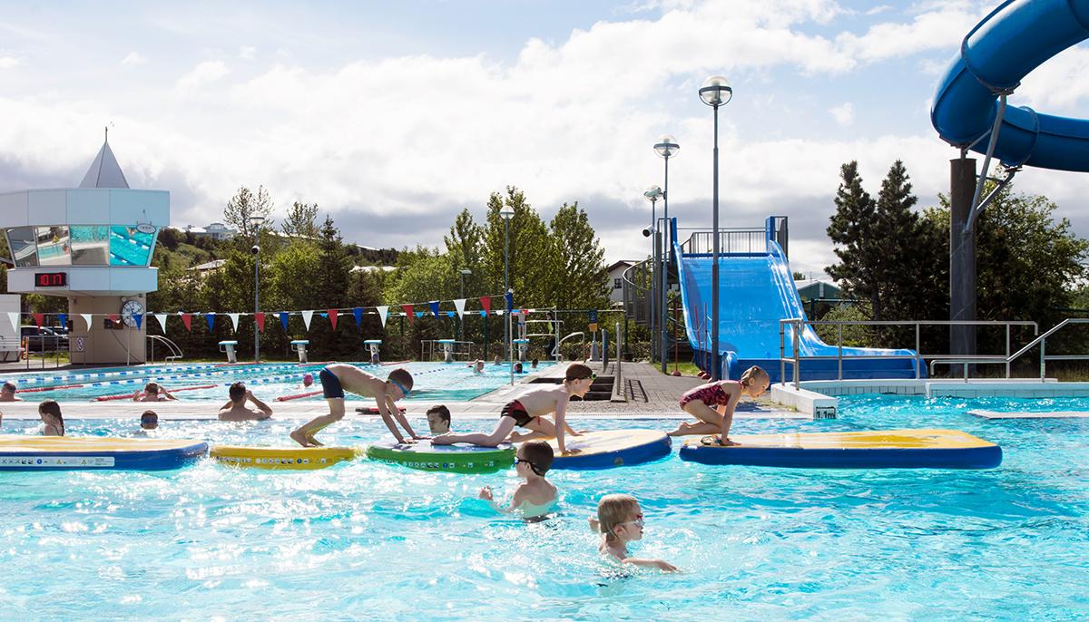 Kids playing on the Wipeout Track at Grafarvogslaug