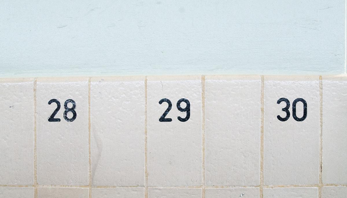Numbered tiles in the old changing rooms at Sundhöll Reykjavík