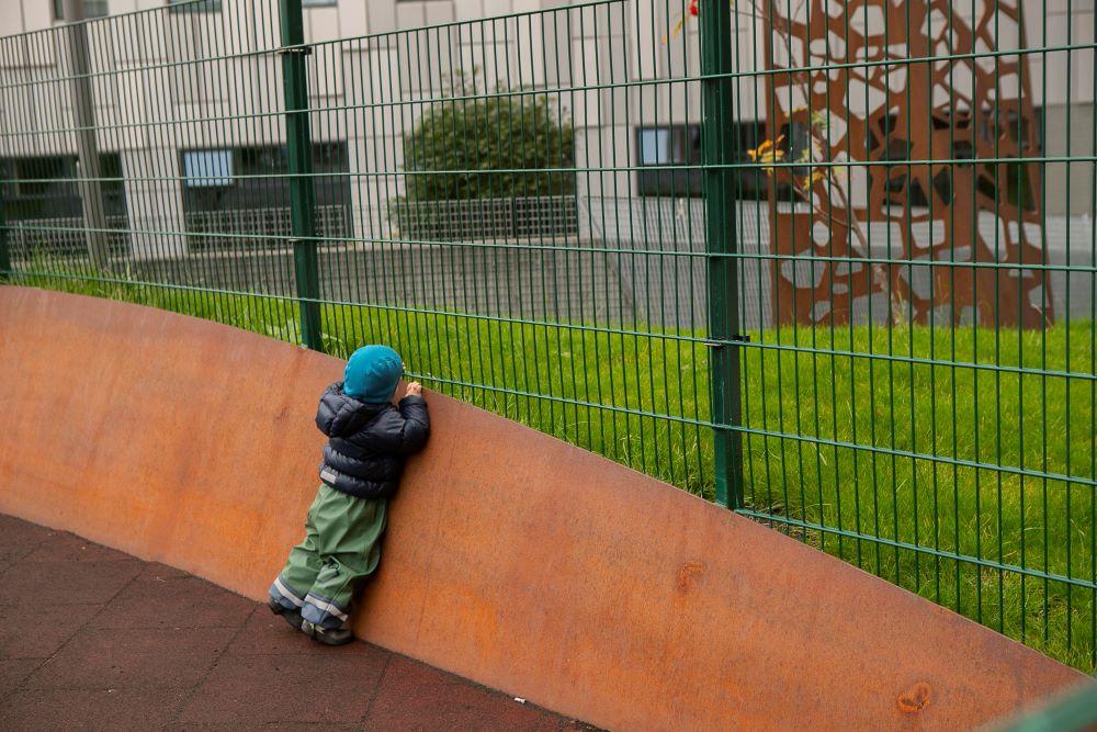 Boy on the grounds of the nursery school at Bríetartún.