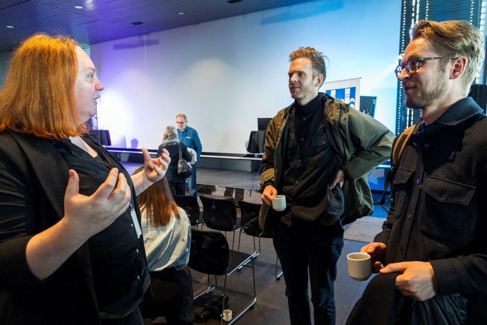 Attendees in discussion at the 2023 Economic and Urban Development meeting.