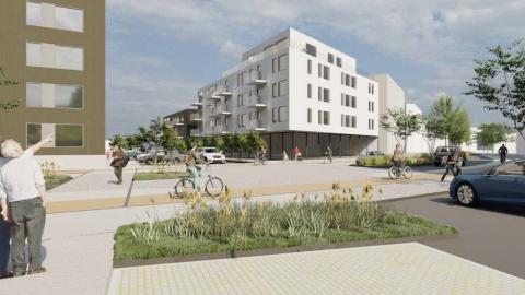 Computer-generated rendering of Sævarhöfði. Multi-family residences, grass, street, people biking and families walking. 